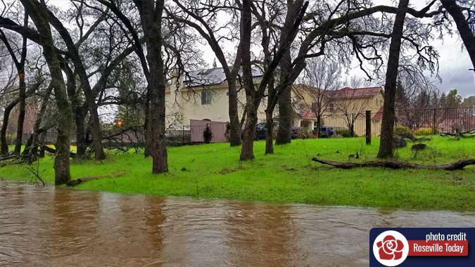 Surging creek in Roseville following heavy rains