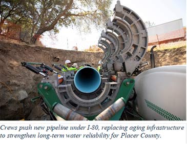 crews work on pipeline