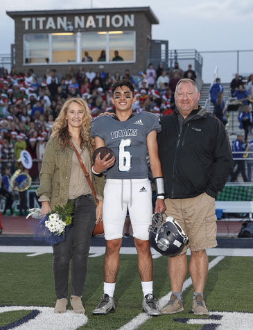 football player with host parents