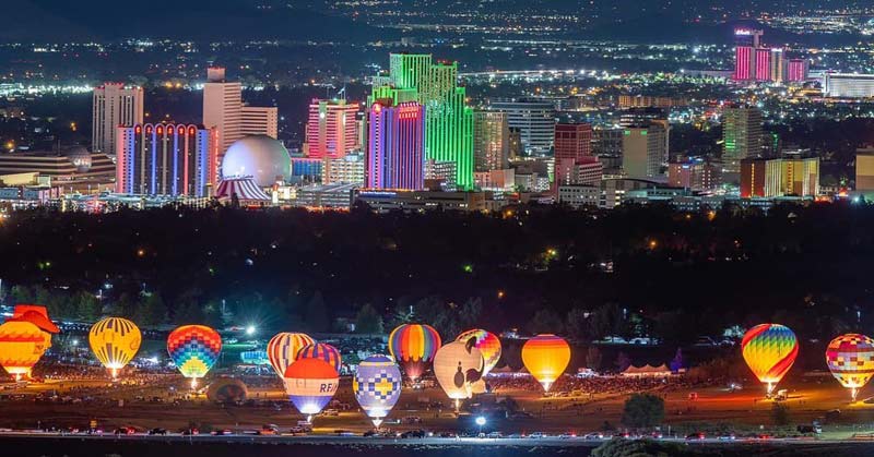 hot balloons lit up in Reno