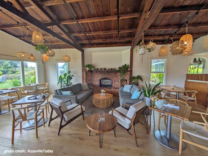 Great room with fireplace for dining and drinks