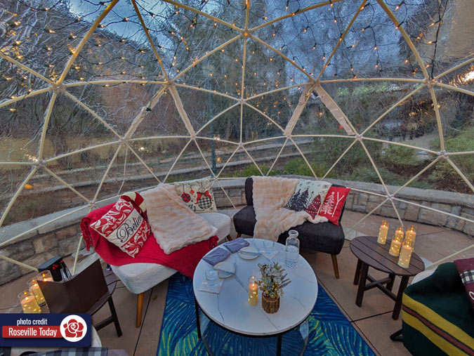 Inside a cozy and warm igloo for dinner and drinks